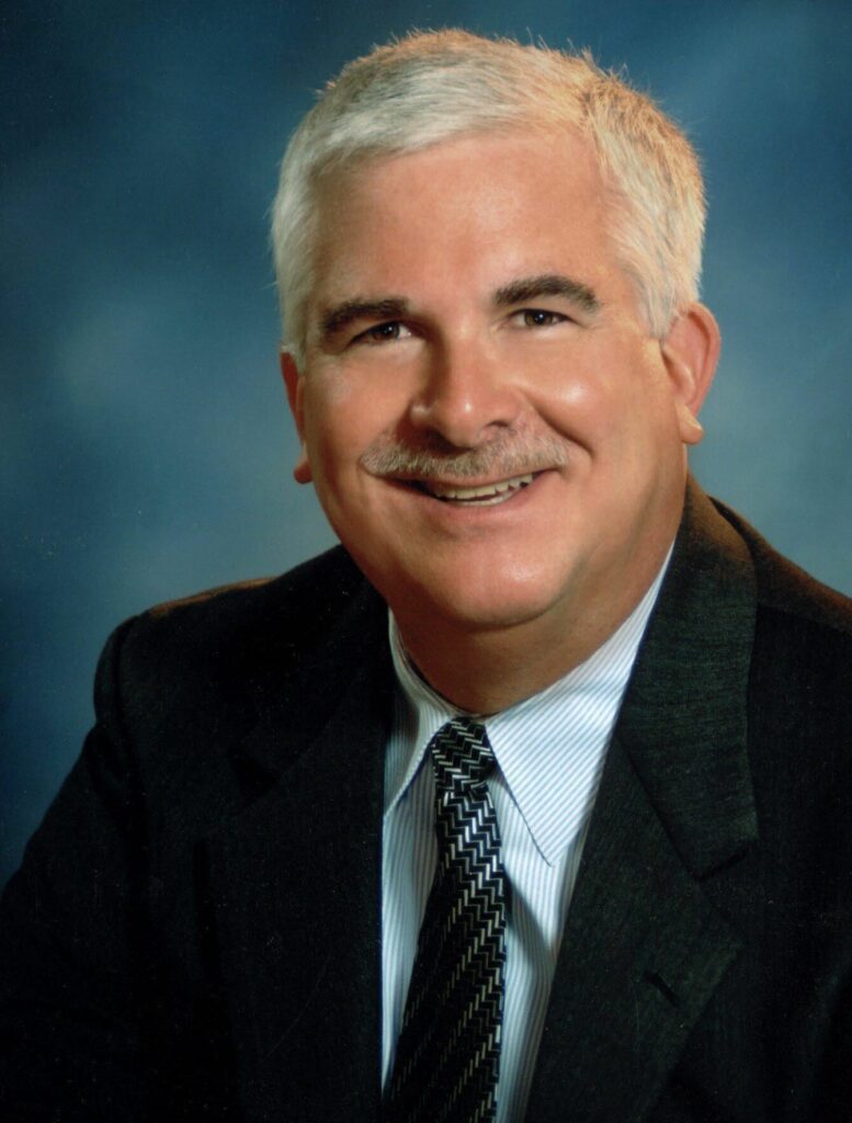 E. THOMAS DUNN, JR.